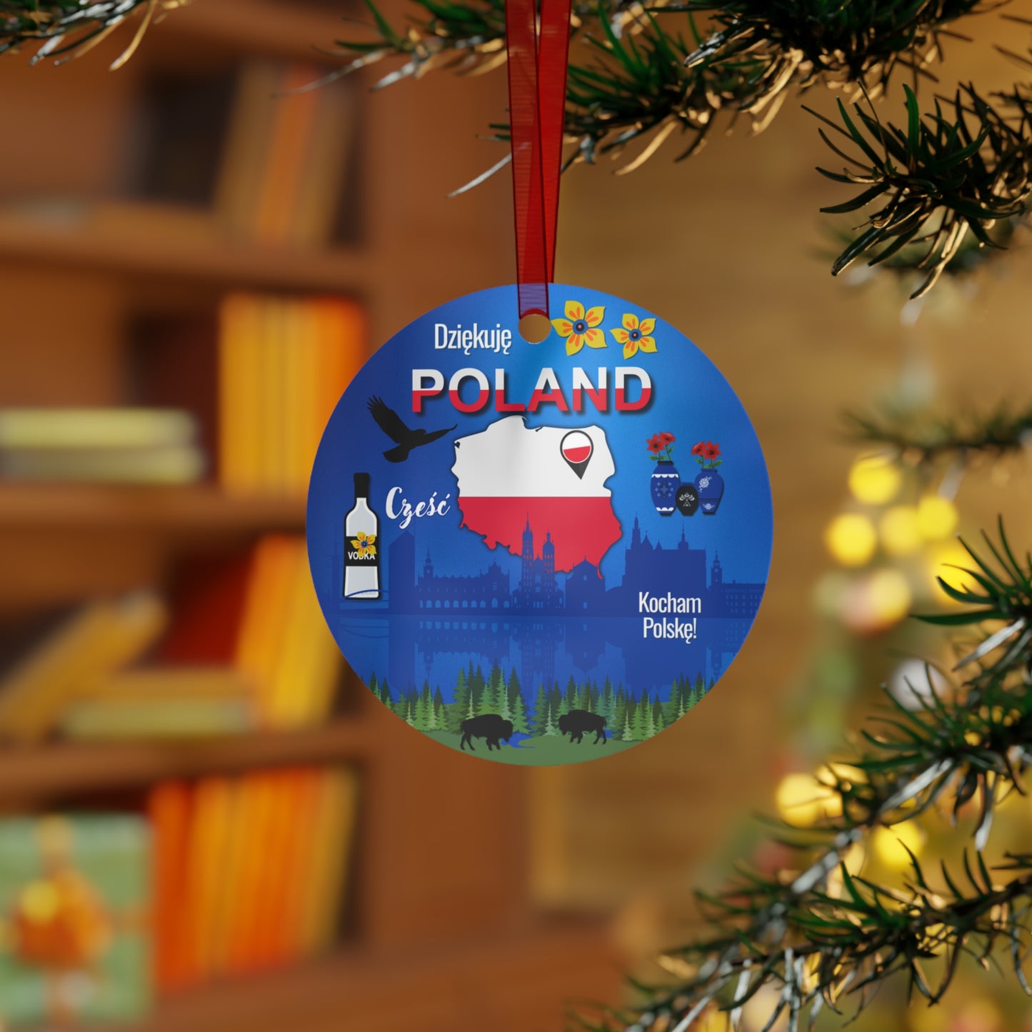 Decorative Christmas ornament with Polish design hanging on a tree.